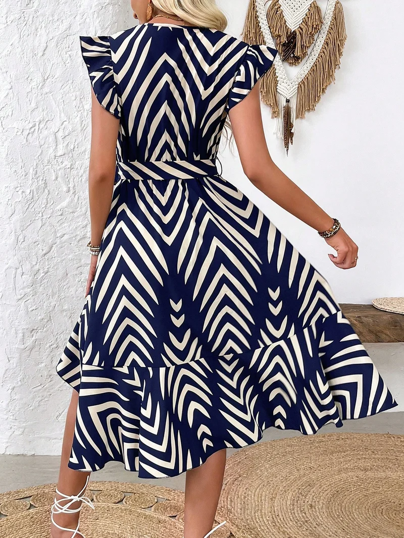 Langes bedrucktes Portemonnaie-Kleid mit Rüschen | La Parisienne