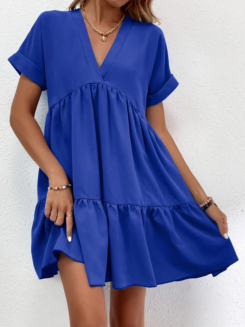 Kurzes, gesmoktes Kleid mit Volants | La Parisienne