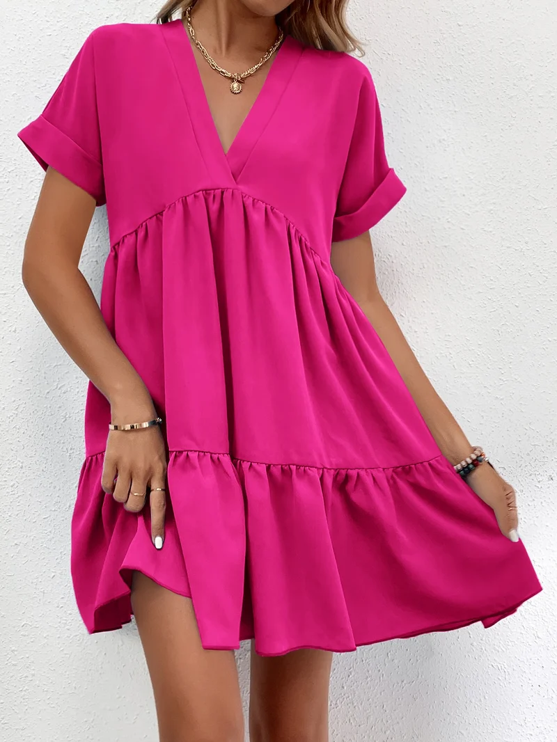 Kurzes, gesmoktes Kleid mit Volants | La Parisienne