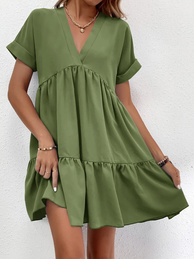 Kurzes, gesmoktes Kleid mit Volants | La Parisienne