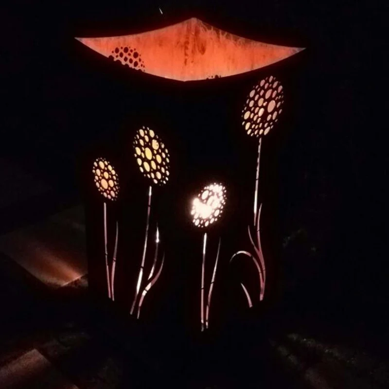 Feuerkorb mit Pusteblumen-Motiv aus Stahl