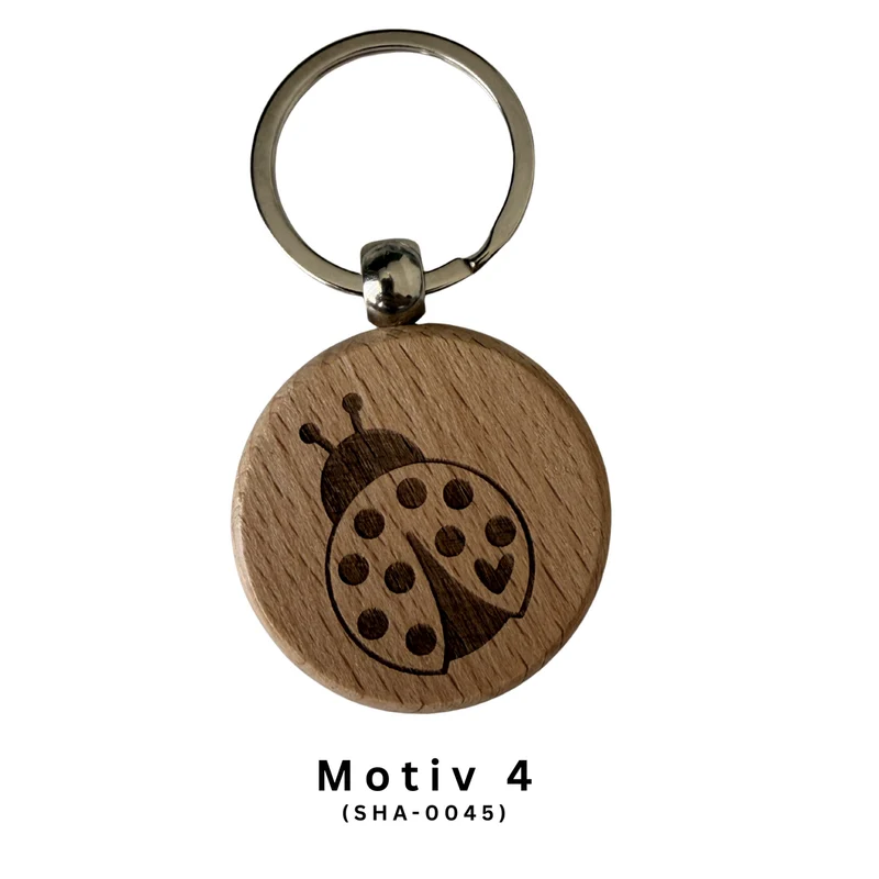 Schlüsselanhänger aus Holz mit Glückssymbol