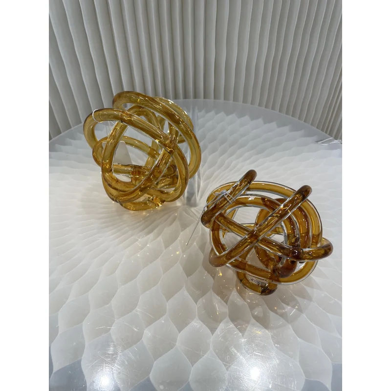 Glasknoten in Gelb – kleine Skulptur mit maritimem Seildesign